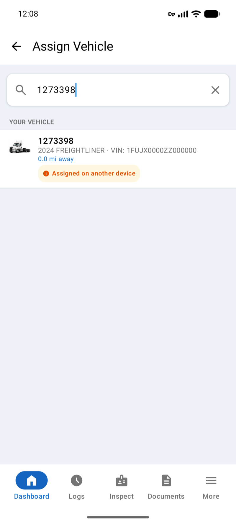 Assign Vehicle screen with the driver's vehicle under Your Vehicle, marked with an Assigned on another device label
